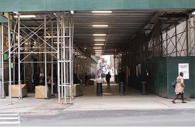 Views of the entrance to Wall Street from Broadway, today and in concept. The "featureless, congested entrance," says the Alliance, would be expanded with the elimination of sidewalk curbs. The design includes sculptural "gateway markers" and consistent and more aesthetically pleasing security bollards. Images courtesy of the Downtown Alliance.