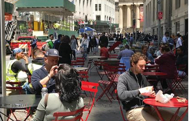 Broad Street, looking north, where the Downtown Alliance proposes a curbless street, added seating that can also serve as planting beds and new paving as well as simplified security bollards. Images courtesy of the Downtown Alliance