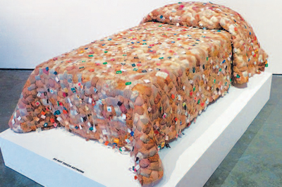 Extending the Useful Life by Ruth Tabancay, made from hand-stitched tea bags, as shown at right.