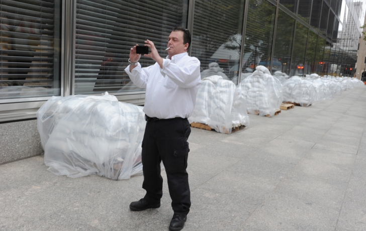 Bundles of sandbags lay beside the Goldman Sachs building Sunday afternoon, waiting to be positioned behind concrete barriers along Vesey Street. Carl Glassman/Tribeca Trib Bundles of sandbags lay beside the Goldman Sachs building Sunday afternoon, waiting to be positioned behind concrete barriers along Vesey Street. Carl Glassman/Tribeca Trib