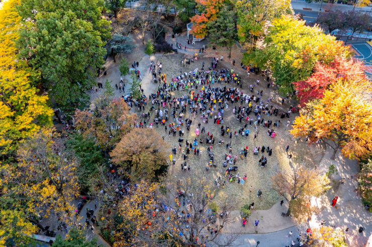 Halloween revelers gather on the Washington Mark Park lawn to show off their costumes and listen to the Queer Big Apple Corps Marching Band. Photo: Linda Buongermino