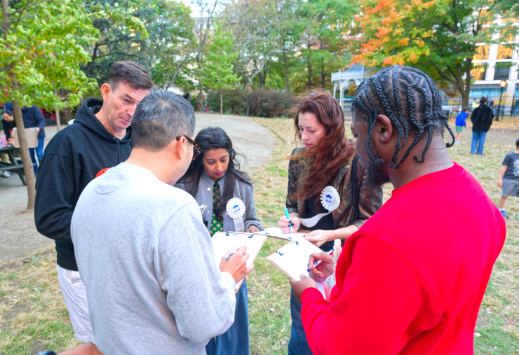 Judges confer before the winners are announced. From left: Nico Victorino, PS 150 principal; Mark Lee, president of the Downtown Soccer League; Rina Collins, founder of Book Nook and Wise Wonder; Lindsey Peers, Owner of Craft Studio; and Jamal Paterson, District Manager, NYC Parks Department. Photo: Carl Glassman/Tribeca Trib